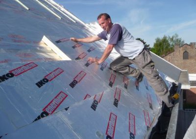 Installation d'une deuxième couche d'isolant extérieur